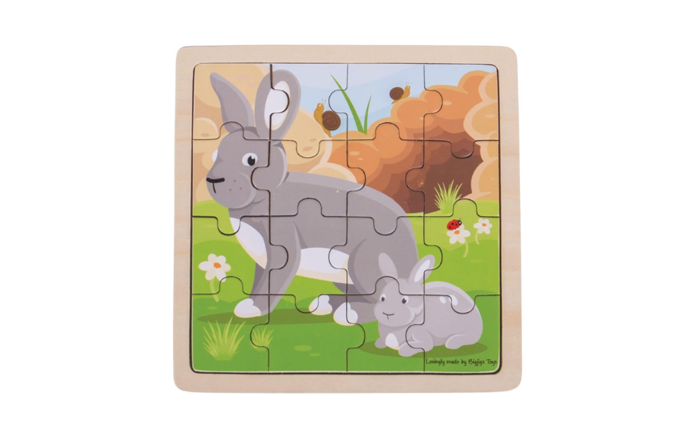 16 piece rabbit kitten puzzle with colorful illustrations of a rabbit and kitten in a grassy field