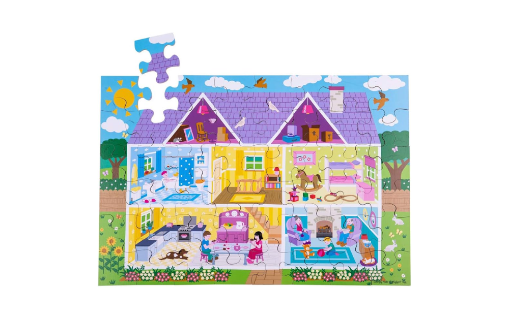 Doll's House Floor Puzzle by Bigjigs Toys featuring colorful rooms and characters in a vibrant design