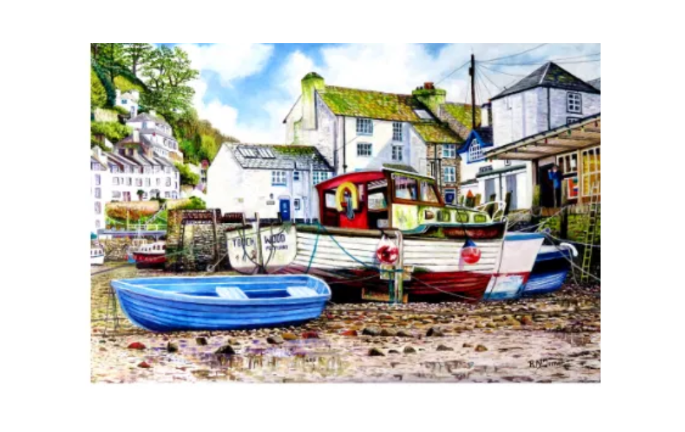House of Puzzles Polperro 1000 piece jigsaw puzzle showing colourful boats on a seaside harbour at low tide