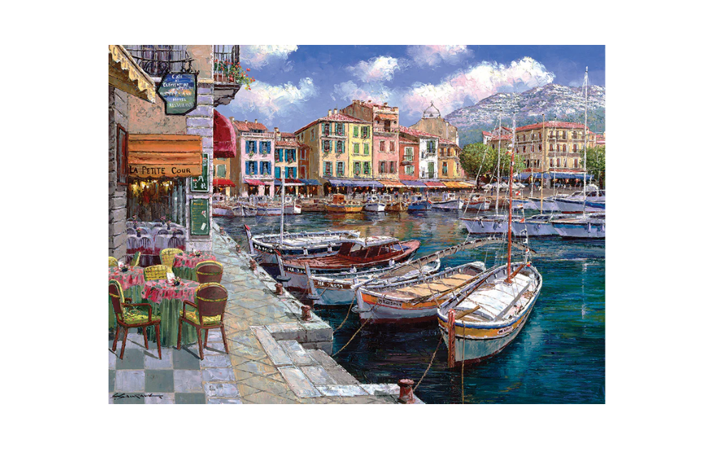 Cobble Hill 1000 Piece Cafe in Cassis Jigsaw Puzzle featuring a vibrant harbour scene with boats and colourful buildings
