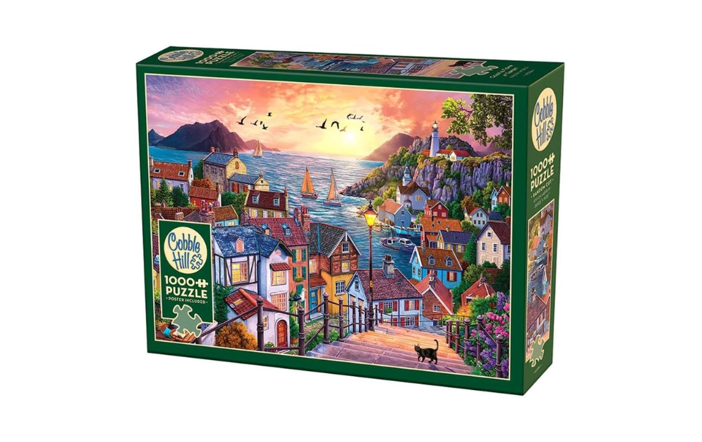 Coastal Town at Sunset 1000 Piece Jigsaw Puzzle by Cobble Hill featuring a picturesque seaside village
