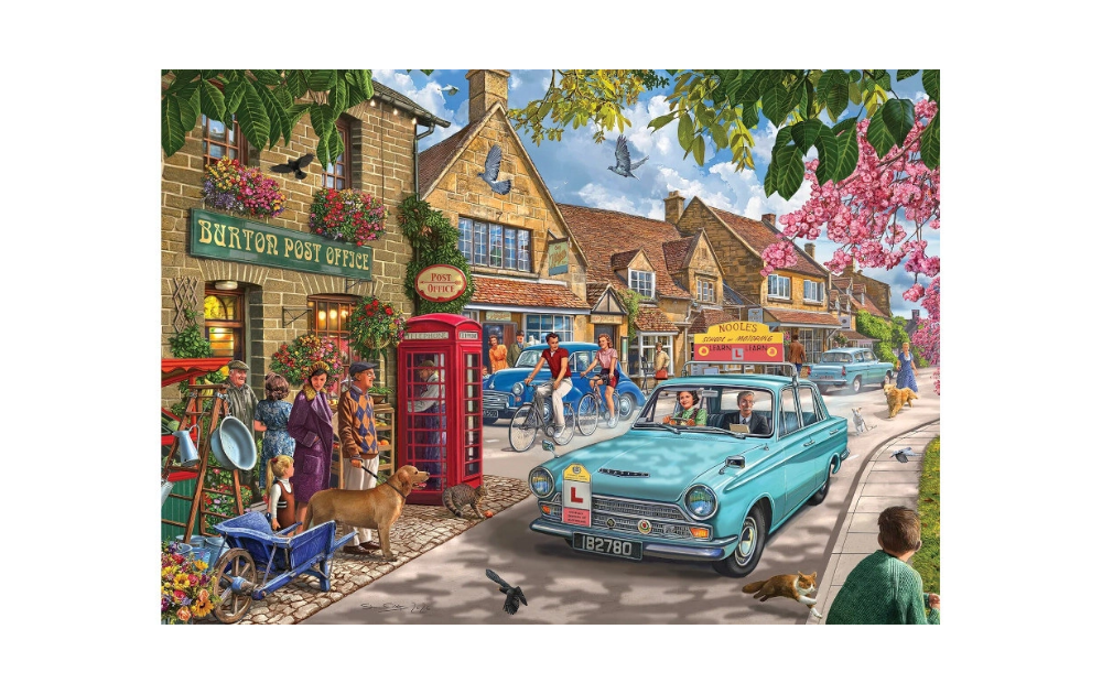 The Driving Test 1000 Piece Jigsaw Puzzle by Falcon depicting a picturesque village scene with retro cars and a post office.