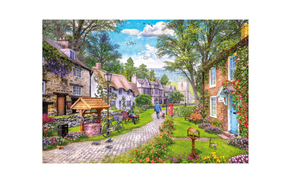 Gibsons 500 Piece A Tranquil Moment Jigsaw Puzzle featuring a picturesque village scene