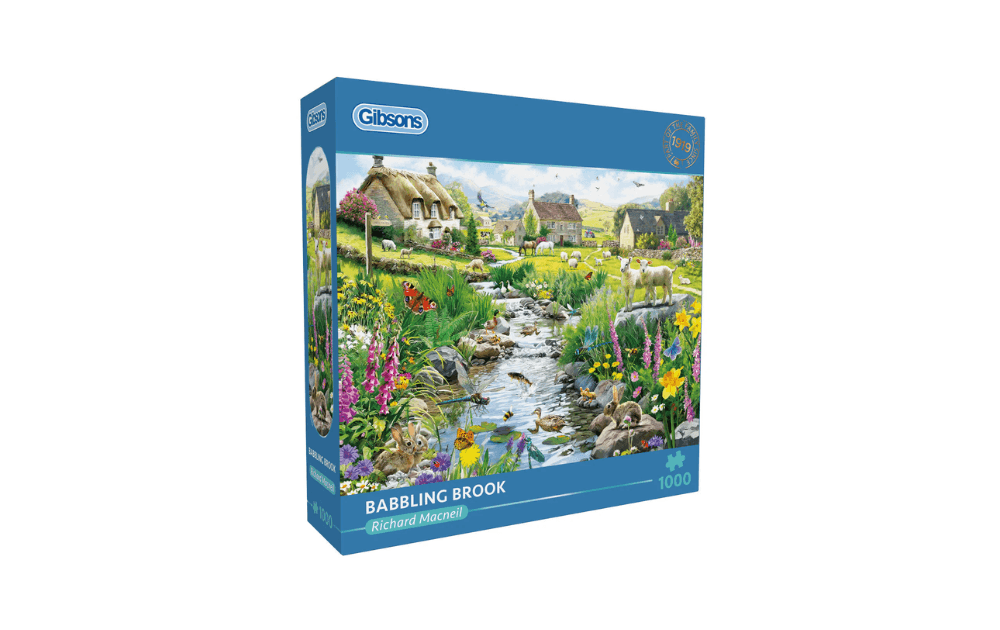 Gibsons Babbling Brook 500 piece jigsaw puzzle featuring a serene landscape with a stream and countryside cottages