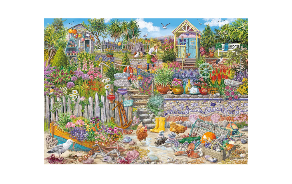 Beachcomber's Garden 1000 piece puzzle featuring a vibrant garden scene with colorful flowers and charming cottages