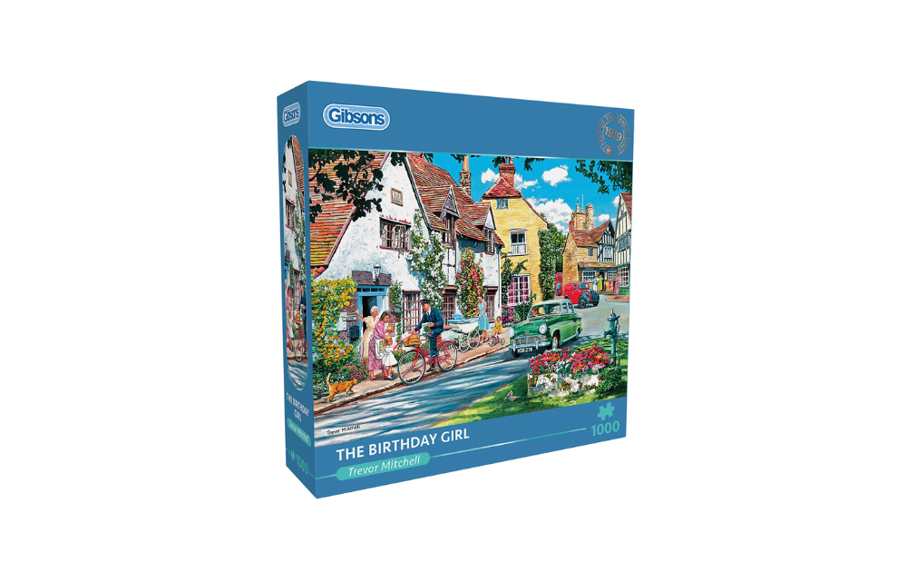 Gibsons Birthday Girl puzzle box featuring a colorful street scene with charming houses and people