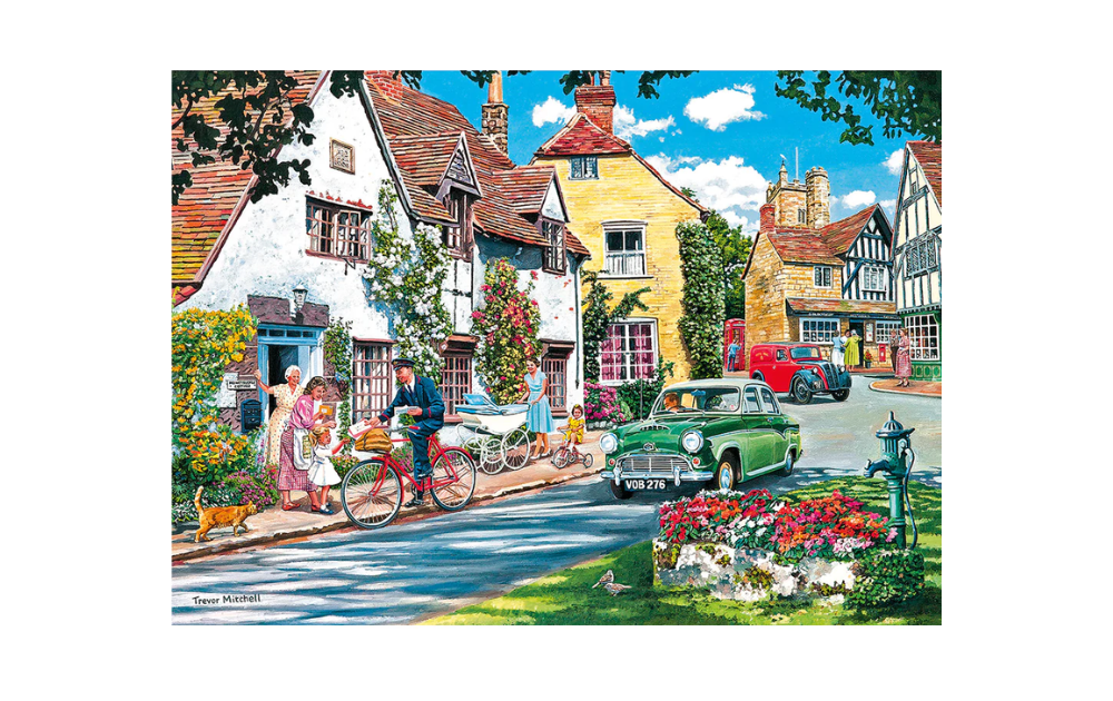 Gibsons Birthday Girl puzzle featuring a vibrant village scene with flowers and classic cars