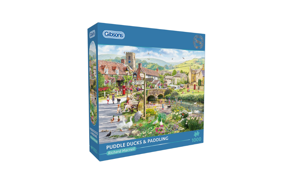Gibsons Puddle Ducks & Paddling puzzle jigsaw showing a riverside village scene with ducks on a pond bridge cottages and families