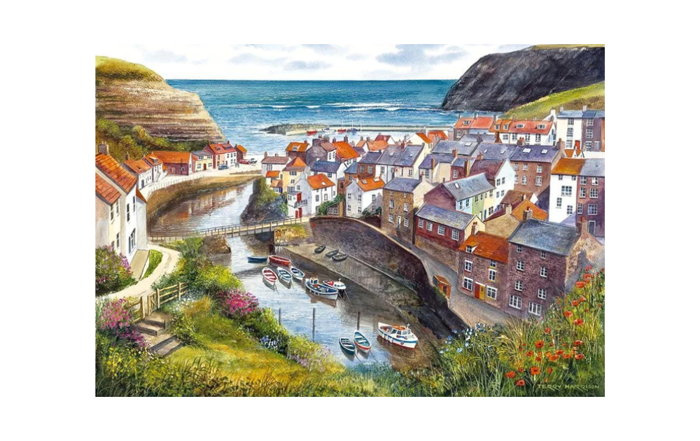 Gibsons Staithes 1000 piece puzzle featuring a scenic harbor village with boats and lush landscapes