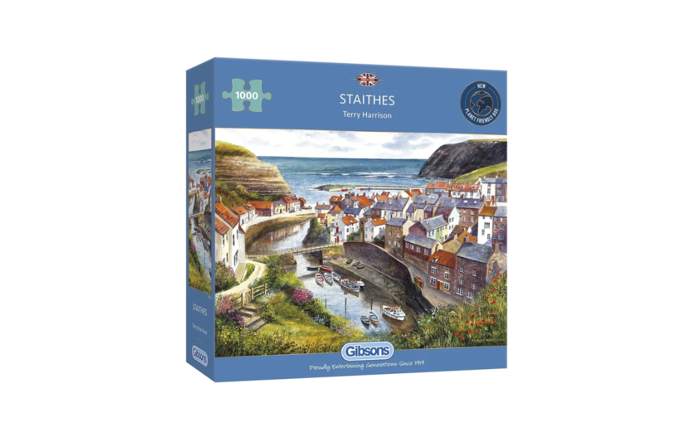 Gibsons Staithes 1000 piece puzzle featuring a colorful coastal village scene by Terry Harrison