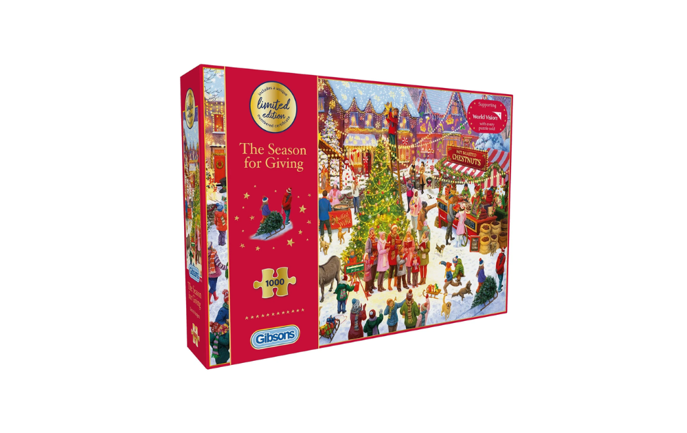 The Season For Giving puzzle Gibsons 1000 piece jigsaw box showing festive Christmas market scene with tree