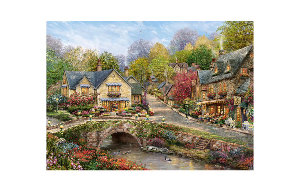 Gibsons Summer in Cobblestone Village 1000 piece Thomas Kinkade puzzle showcasing a quaint village scene