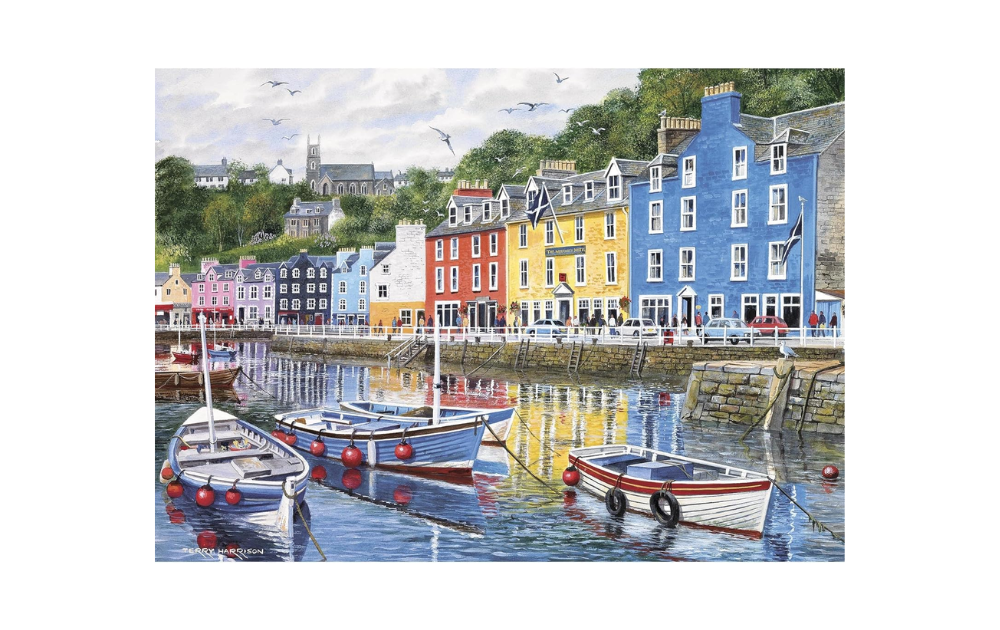 Gibsons Tobermory jigsaw puzzle featuring colorful waterfront buildings and boats in a scenic harbor