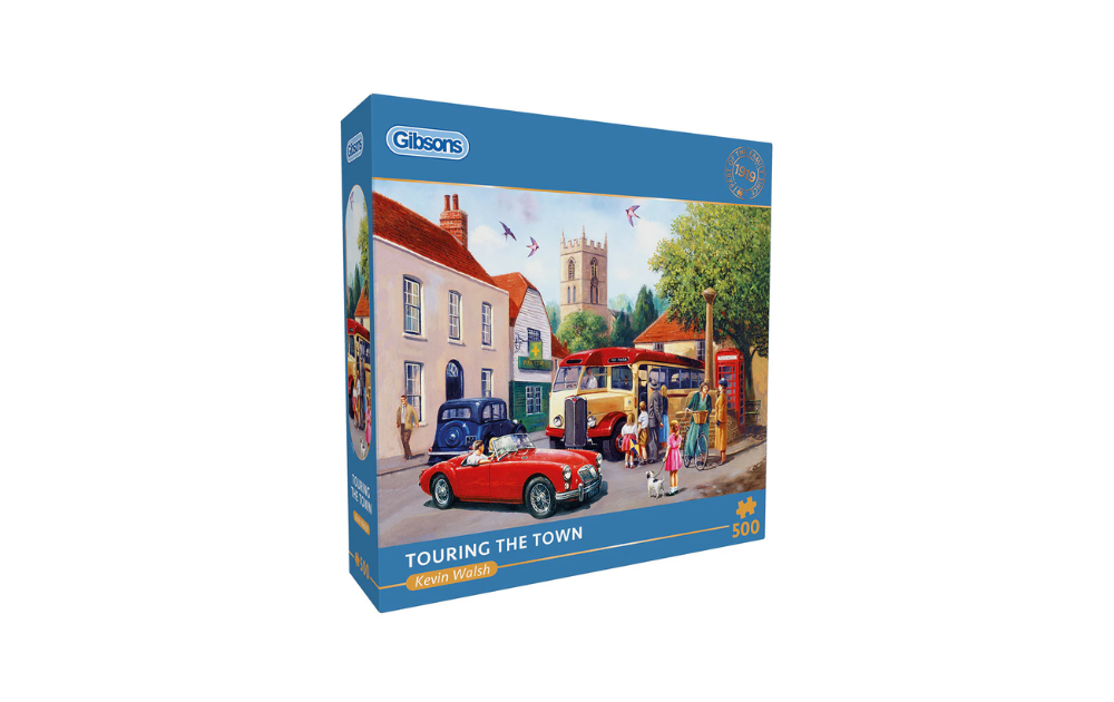 Gibsons jigsaw box featuring Touring the Town 500 piece jigsaw puzzle. Colourful village street scene