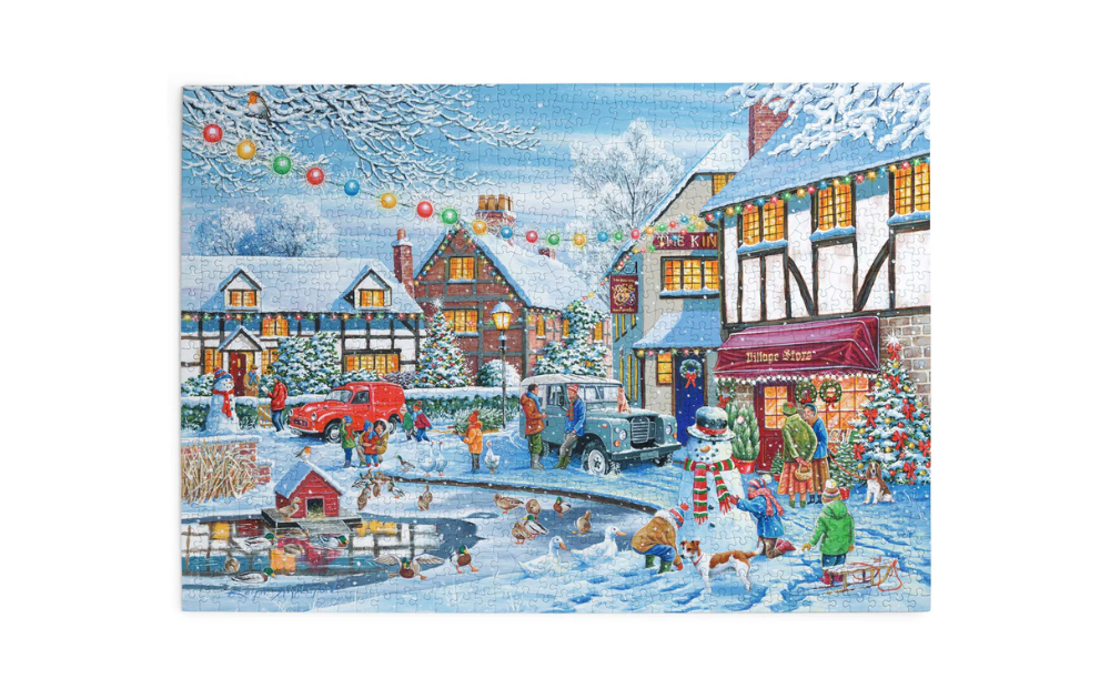 Snowy village scene with children and a snowman, No 20 - On Thin Ice 1000 Piece Find the Differences Jigsaw Puzzle from House of Puzzles