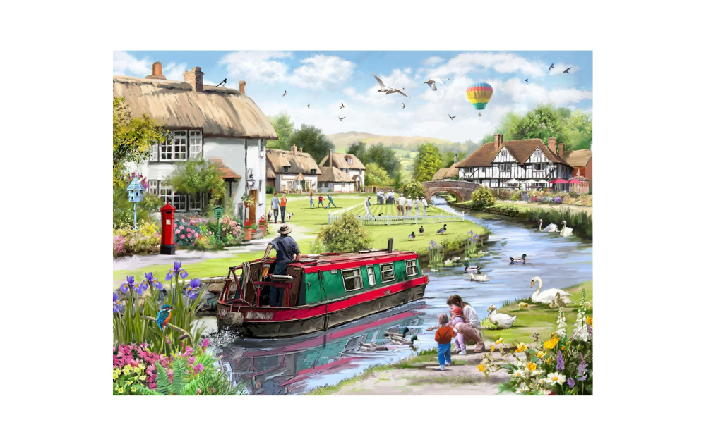 Passing Through 500 Piece Jigsaw Puzzle by House of Puzzles featuring a scenic canal with a boat and village life
