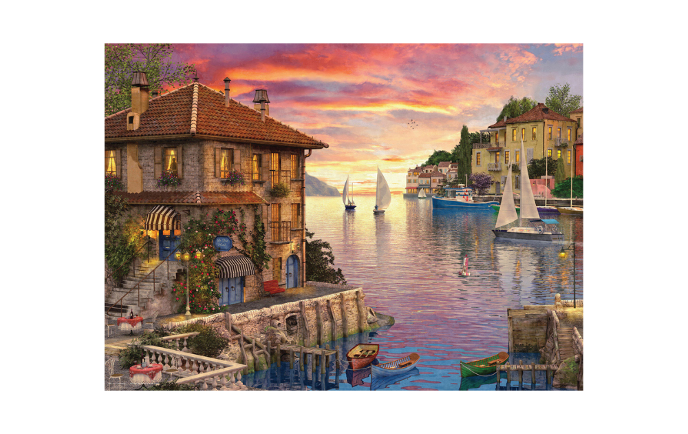 Eurographics Mediterranean harbour jigsaw puzzle depicting sailboats and colourful architecture at sunset