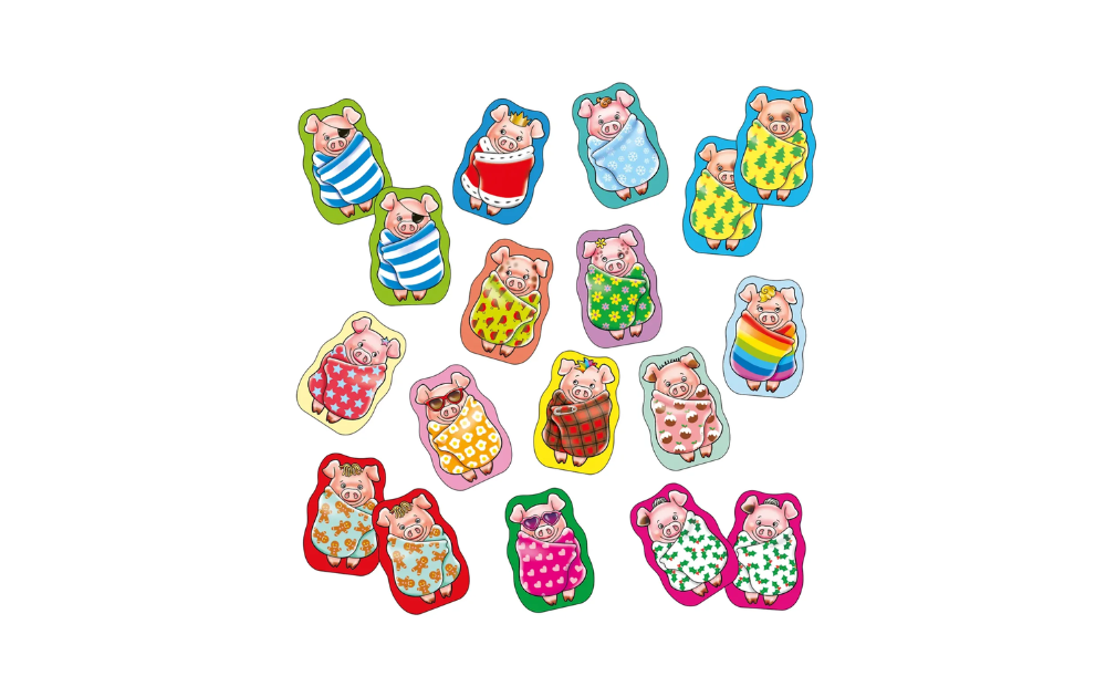 Orchard Toys Pigs in Blankets colorful puzzle pieces featuring cute pig characters in various blankets