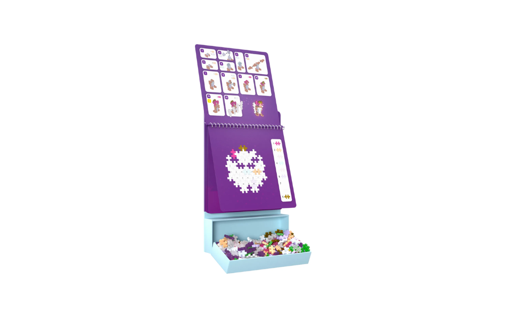 Plus Plus Activity Pad - Enchanted Forest with colourful puzzle pieces and design guide for creative play
