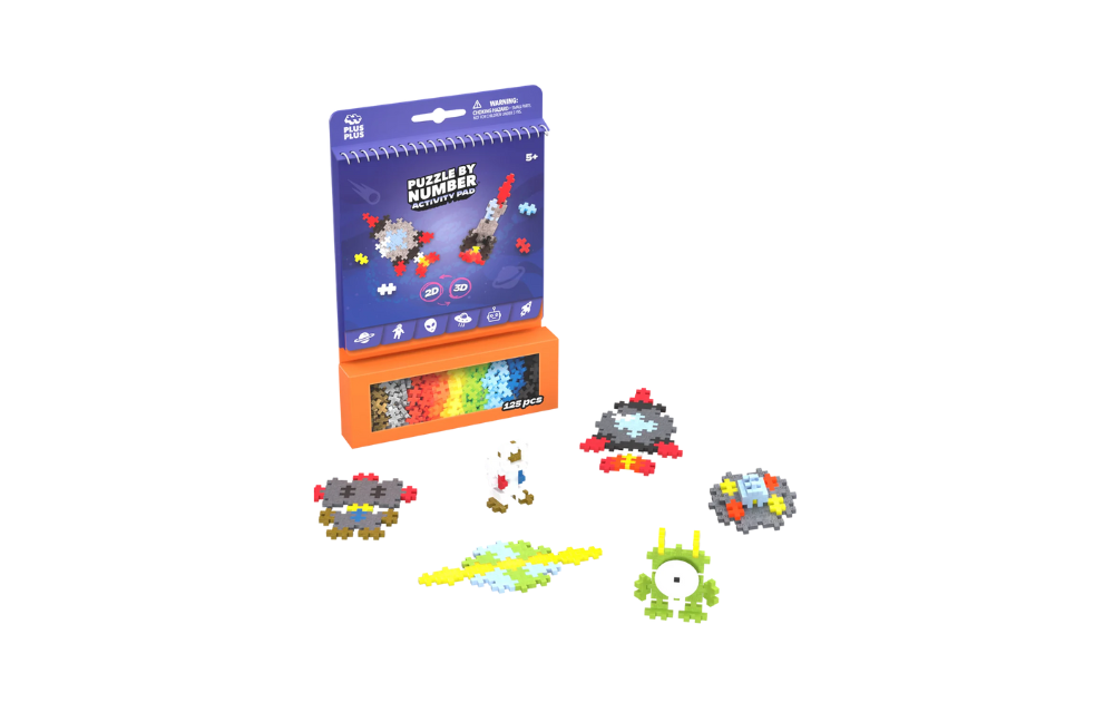 Plus Plus activity pad featuring space-themed puzzle pieces for creative building and play