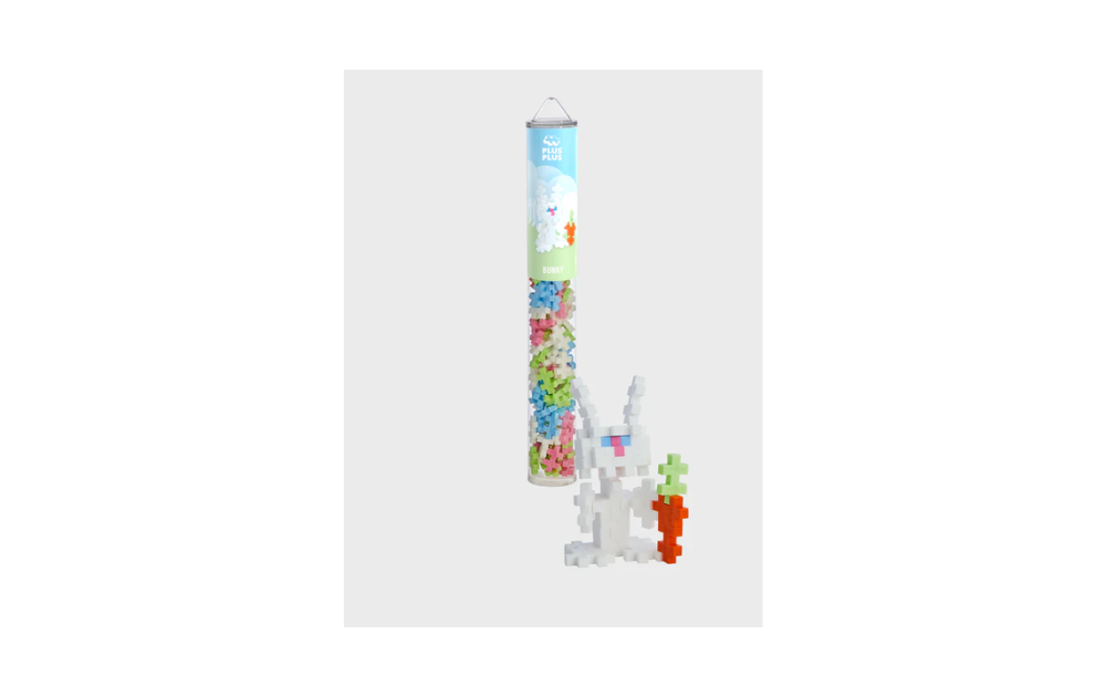 Plus Plus Bunny 100 piece puzzle tube featuring colorful building pieces and a bunny figure
