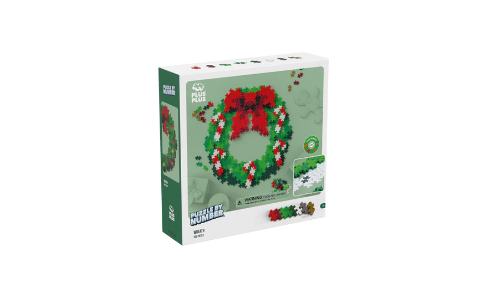 Christmas wreath puzzle by numbers featuring colorful interlocking pieces for fun holiday activity