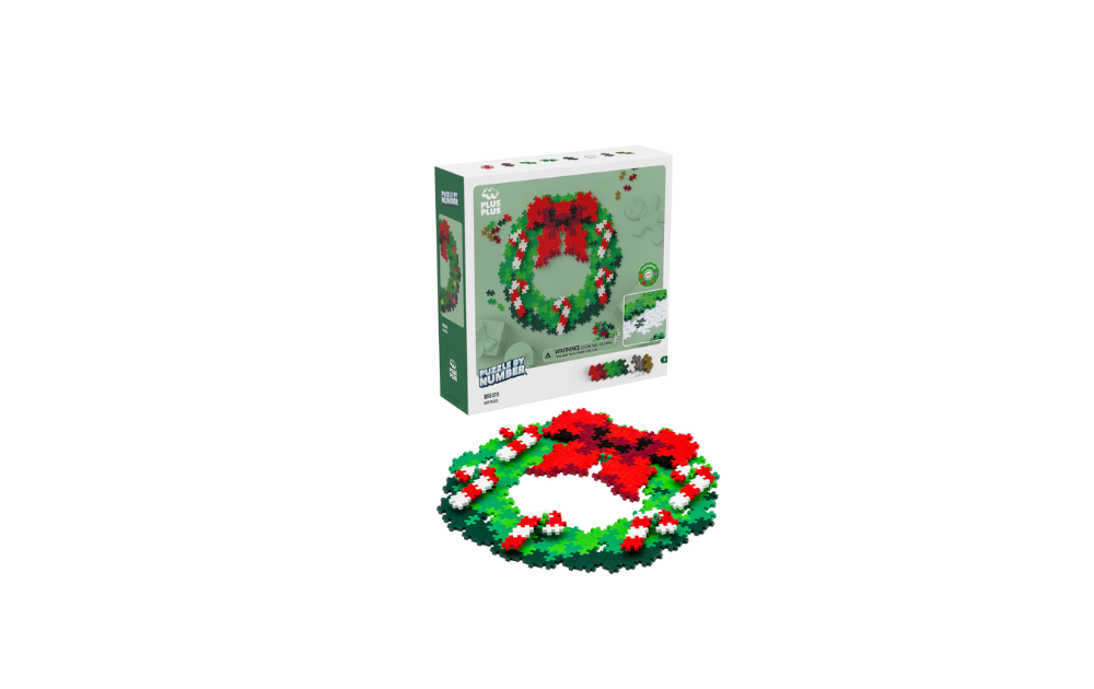 Christmas wreath puzzle by numbers featuring colorful pieces and a festive design for creative fun