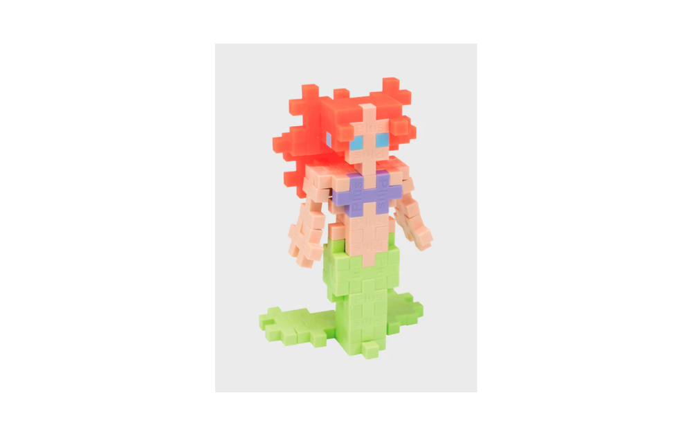 Plus Plus - Mermaid 100 piece tube featuring a colorful mermaid figure with vibrant hair and a green tail