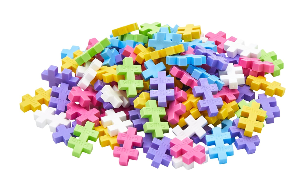 Plus Plus pastel 100 piece set with colorful building pieces in various pastel shades for creative play