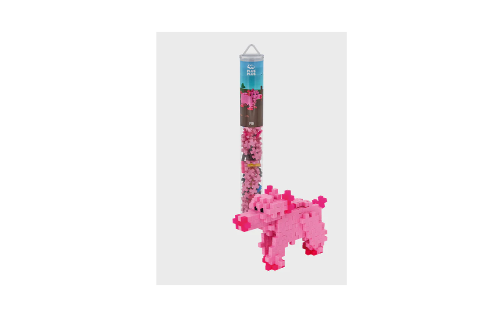Plus Plus Pig building toy in a 100 piece tube, perfect for creative and imaginative play.