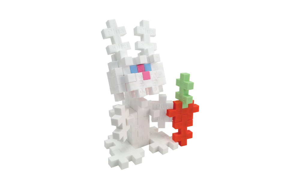 Plus Plus Bunny 100 piece puzzle featuring a white bunny holding a carrot for creative play