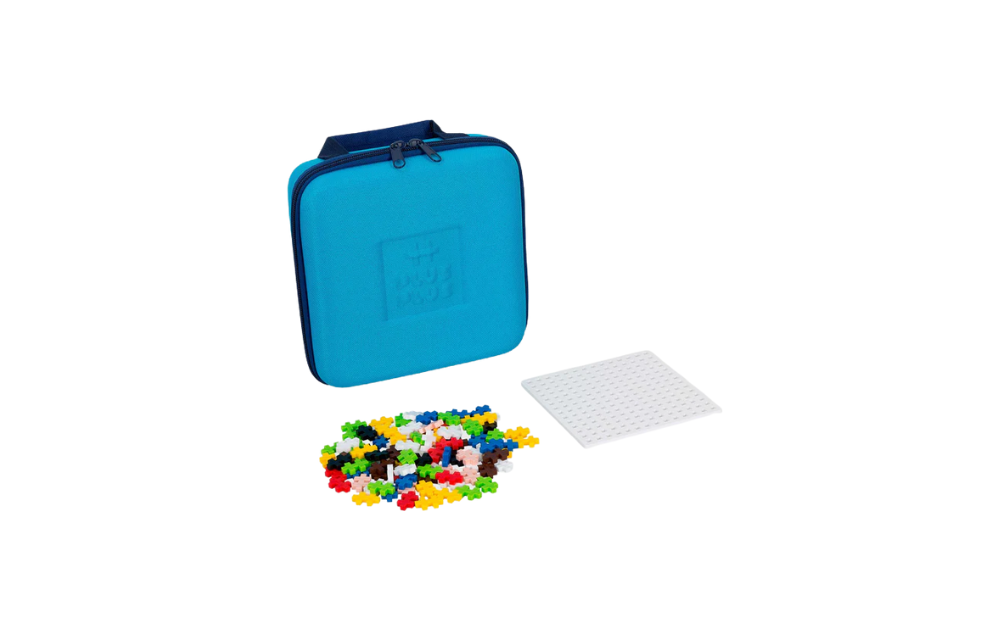 Plus Plus travel case in blue with colorful puzzle pieces and white baseplate for creative building