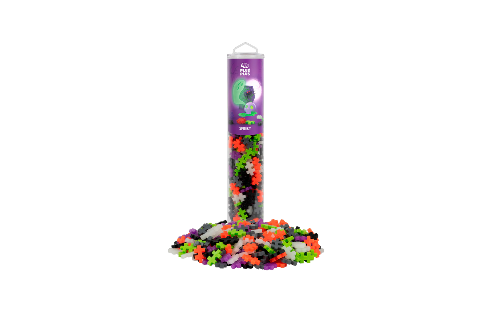 Plus Plus spooky colourmix tube with scattered black orange purple green and white puzzle pieces for creative building