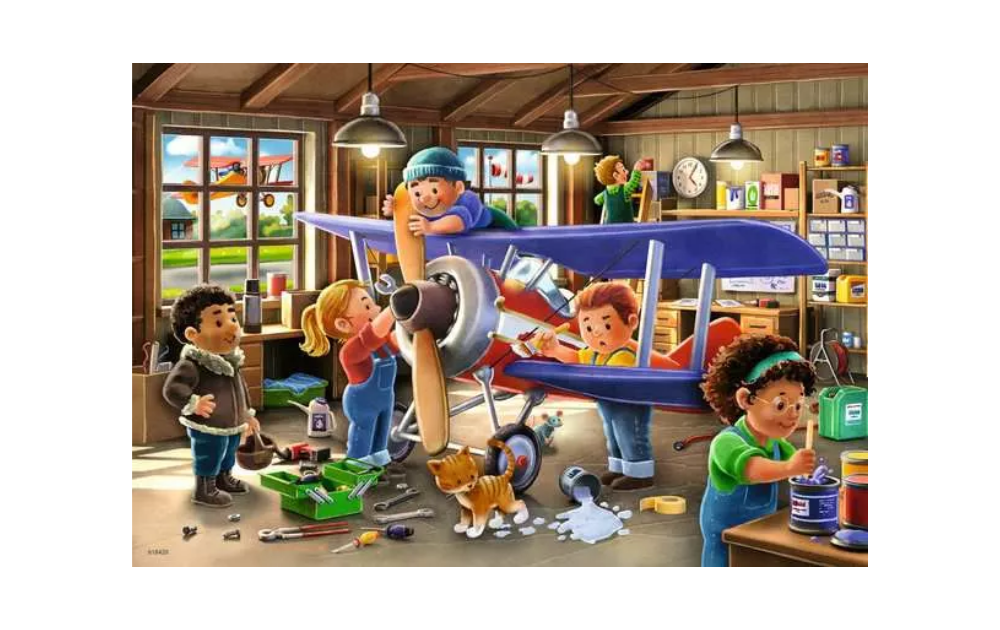 Ravensburger airplane and train jigsaw puzzle set in a workshop with children building a model aeroplane