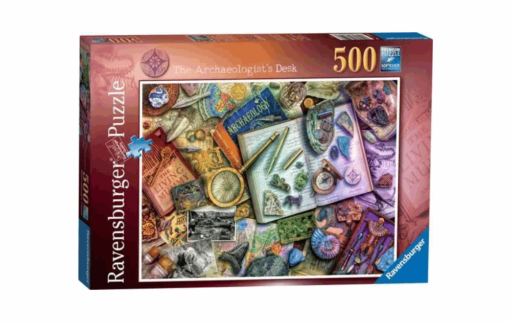 Ravensburger Archaeologist Puzzle featuring artifacts and tools on a desk with 500 pieces for puzzle enthusiasts