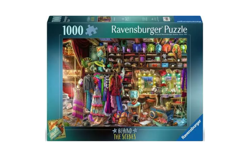 Behind the Scenes Ravensburger puzzle showcasing a vibrant selection of costumes and props in a creative studio setting.