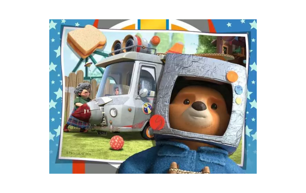 Ravensburger Childrens Paddington Bear jigsaw puzzles showing Paddington in a tin helmet with rocket van background