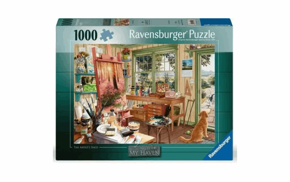The Artist's Shed 1000 piece puzzle box by Ravensburger showcasing a warm artistic studio interior
