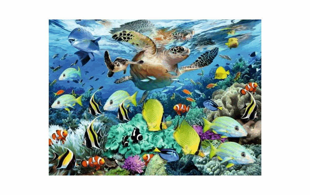 Ravensburger Underwater Paradise puzzle featuring colorful fish and a sea turtle in a vibrant coral reef scene