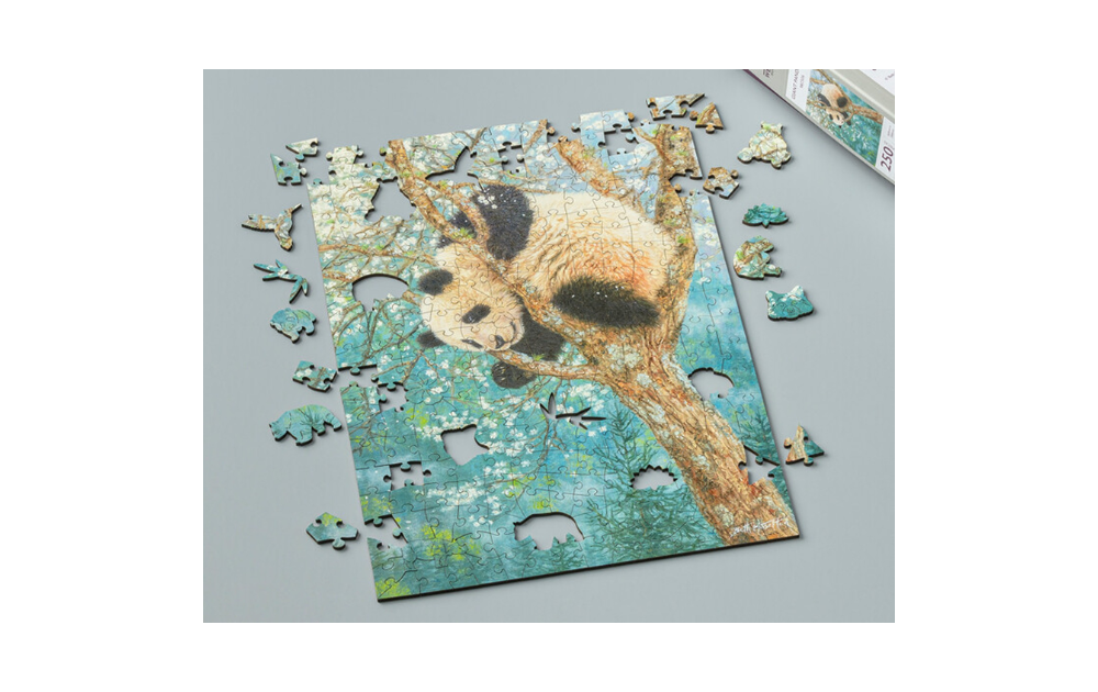 Giant Panda Cub jigsaw puzzle by Wentworth with 500 pieces showing a panda in a tree