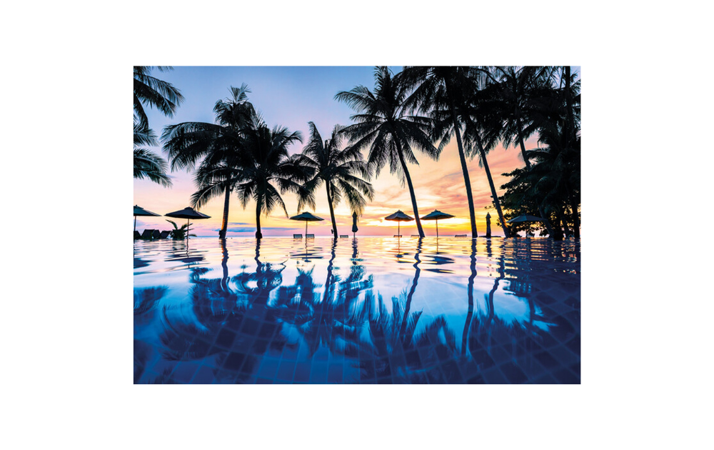 Wooden jigsaw puzzle of a tropical sunset with 40 pieces by Wentworth featuring palm trees and ocean reflections