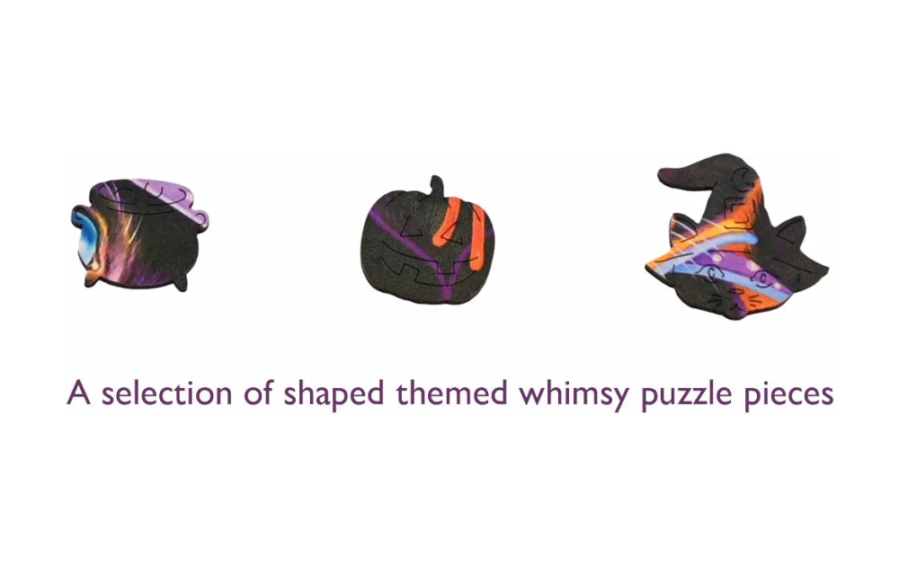 A selection of shaped whimsy pieces from the wooden cat jigsaw puzzle by Wentworth