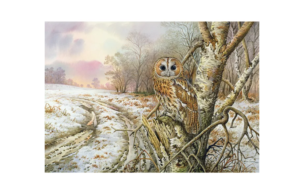 Wentworth wooden owl jigsaw puzzle featuring a detailed owl perched on a tree in a snowy landscape